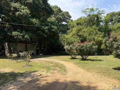 Tucked away on 7 beautiful wooded acres, this private retreat - photo 12