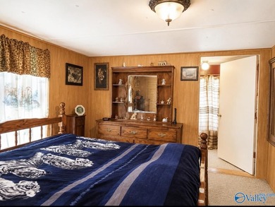 Tucked away on 7 beautiful wooded acres, this private retreat - photo 15