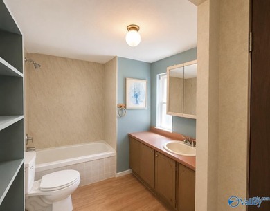 Tucked away on 7 beautiful wooded acres, this private retreat - photo 19