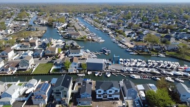 Rare South Bellmore Waterfront Opportunity! This meticulously - photo 1