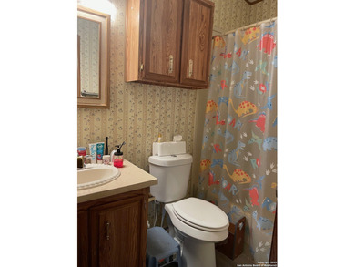 Peaceful country living with two homes on this 8.5 acres. Main