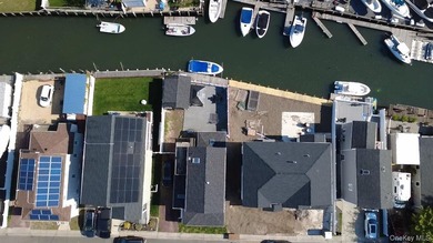 Rare South Bellmore Waterfront Opportunity! This meticulously - photo 2