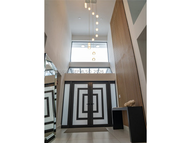 Exquisite modern estate located in the prestigious Village of - photo 23