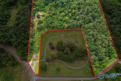 Tucked away on 7 beautiful wooded acres, this private retreat - photo 23