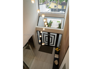 Exquisite modern estate located in the prestigious Village of - photo 25