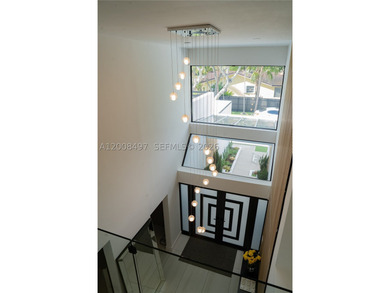 Exquisite modern estate located in the prestigious Village of - photo 26