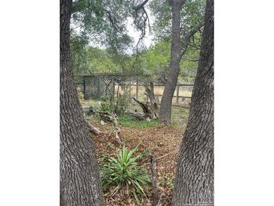 Peaceful country living with two homes on this 8.5 acres. Main