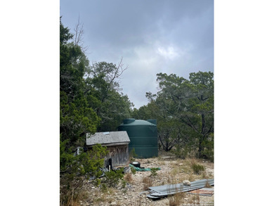 Peaceful country living with two homes on this 8.5 acres. Main