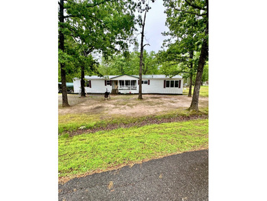 This spacious 4bedroom, 2bath manufactured home sits on 0.66 - photo 1