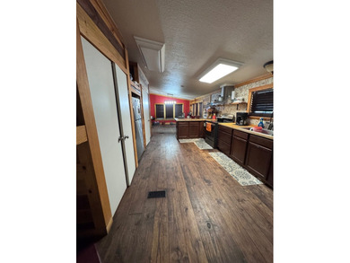 This spacious 4bedroom, 2bath manufactured home sits on 0.66 - photo 8