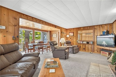 There's something familiar about this lake house. Maybe it's the - photo 12