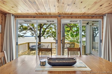 There's something familiar about this lake house. Maybe it's the - photo 13