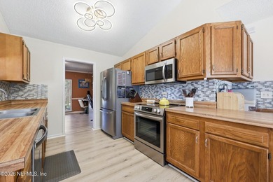 Welcome home to this inviting pool home with a with a brand new - photo 17