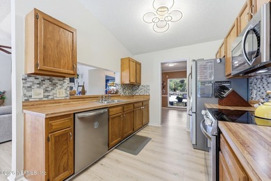 Welcome home to this inviting pool home with a with a brand new - photo 18