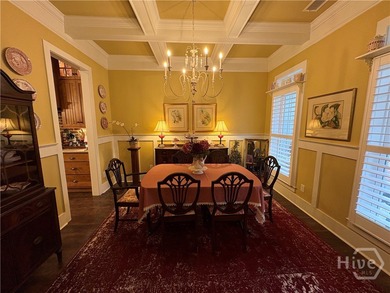 Tucked away on a serene two-acre wooded lot, this stunning