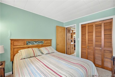 There's something familiar about this lake house. Maybe it's the - photo 20