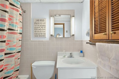There's something familiar about this lake house. Maybe it's the - photo 21