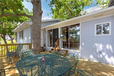 There's something familiar about this lake house. Maybe it's the - photo 24
