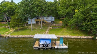There's something familiar about this lake house. Maybe it's the - photo 25