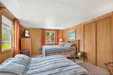 There's something familiar about this lake house. Maybe it's the - photo 29