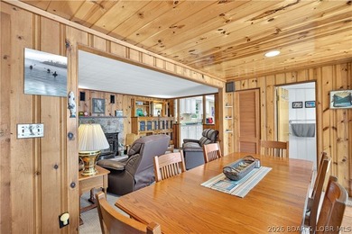 There's something familiar about this lake house. Maybe it's the - photo 30