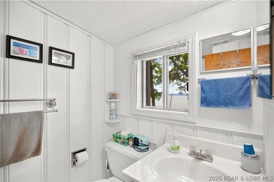 There's something familiar about this lake house. Maybe it's the - photo 31