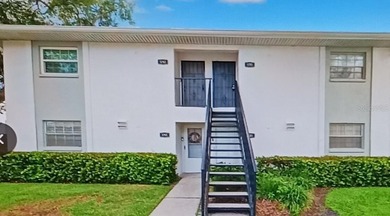 Upstairs end unit in desirable South Tampa area. Two bedrooms - photo 1