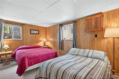 There's something familiar about this lake house. Maybe it's the - photo 33