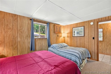 There's something familiar about this lake house. Maybe it's the - photo 34