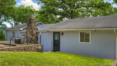 There's something familiar about this lake house. Maybe it's the - photo 36