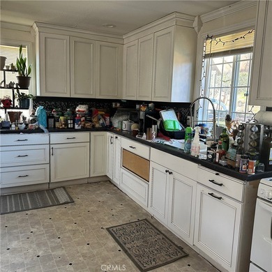 This property features a charming 3-bedroom, 2-bath manufactured - photo 11