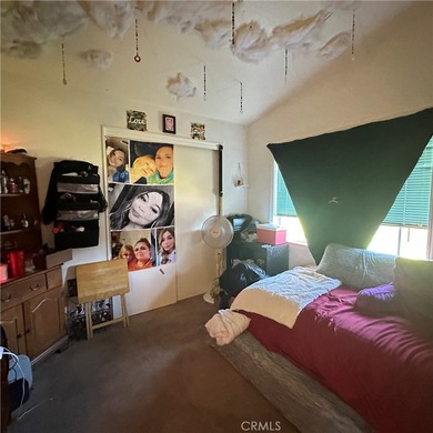 This property features a charming 3-bedroom, 2-bath manufactured - photo 13