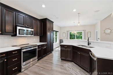 Porto Cima Perfection | Golf Front with Evergreen Cove Views | - photo 14