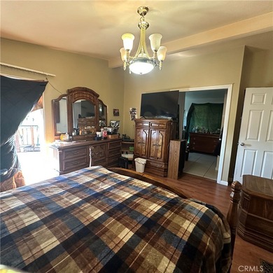 This property features a charming 3-bedroom, 2-bath manufactured - photo 14