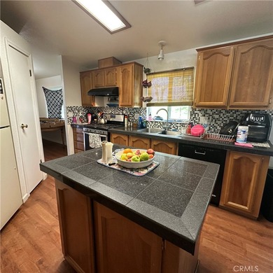 This property features a charming 3-bedroom, 2-bath manufactured - photo 21