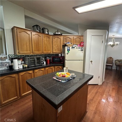 This property features a charming 3-bedroom, 2-bath manufactured - photo 25