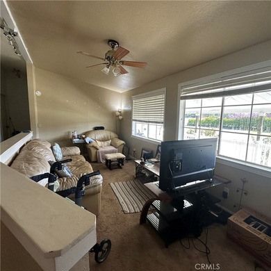 This property features a charming 3-bedroom, 2-bath manufactured - photo 29