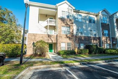 Welcome to 4519 Sagedale Drive, Unit 101, a spacious first-floor - photo 1