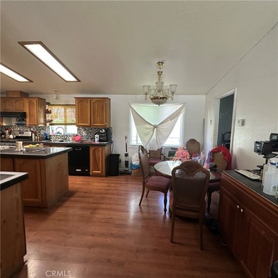 This property features a charming 3-bedroom, 2-bath manufactured - photo 31