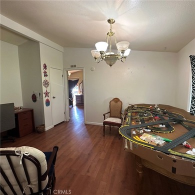 This property features a charming 3-bedroom, 2-bath manufactured - photo 32