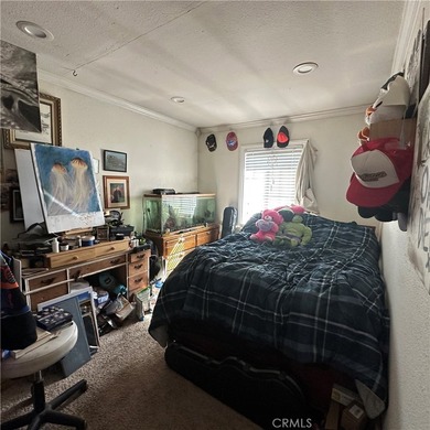This property features a charming 3-bedroom, 2-bath manufactured - photo 33