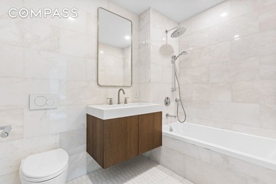Residence 5B is a beautifully designed three-bedroom - photo 8