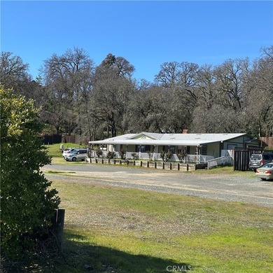 This property features a charming 3-bedroom, 2-bath manufactured - photo 50