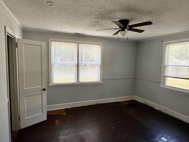 This charming 3-bedroom, 1-bath home is nestled in the desirable - photo 11