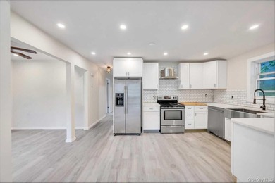 Completely renovated in 2026, with new range hood and bathroom - photo 11