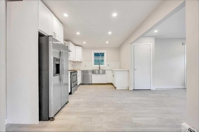 Completely renovated in 2026, with new range hood and bathroom - photo 12