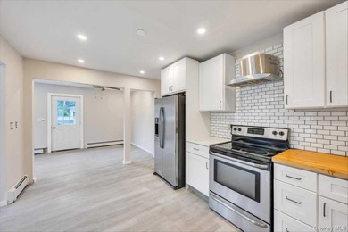 Completely renovated in 2026, with new range hood and bathroom - photo 13