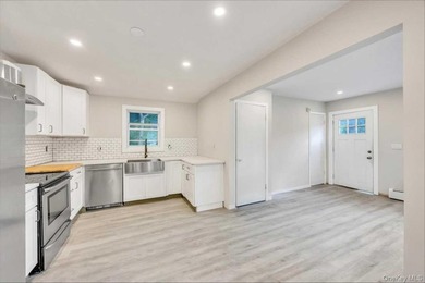 Completely renovated in 2026, with new range hood and bathroom - photo 14