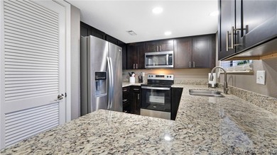 Welcome to this beautifully updated, move-in ready villa in one - photo 6