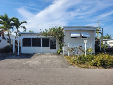 Lake Home For Sale in West Palm Beach, Florida